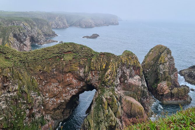 Coastal Villages of Aberdeenshire - Gardenstown and Crovie: the day begins beneath red cliffs