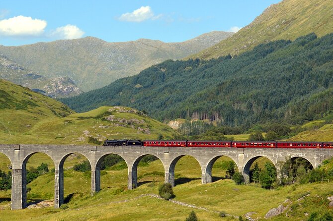 Edinburgh: Glenfinnan Viaduct, Glencoe & Fort William Guided Tour - Glenfinnan Monument adds meaning to the stop