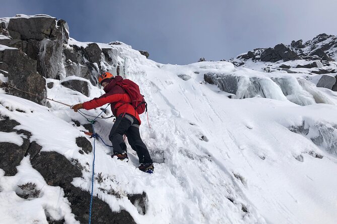 Private Guided Winter Mountaineering Experience in the Cairngorms - At the frozen cliffs, the day becomes technical