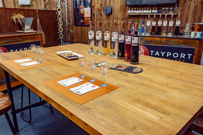Tayport Distillery Tour & Tastings - Waxing a miniature bottle and browsing the shop
